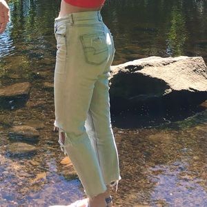 American Eagle Size 8 Regular White washed jeans ripped left knee